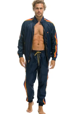 Wind Breakers | Aviator Nation MEN'S 4 STRIPE WIND PANT - NAVY