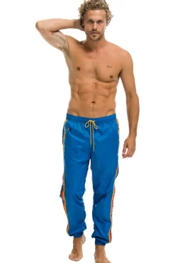 Wind Breakers | Aviator Nation MEN'S 4 STRIPE WIND PANT - SNORKEL BLUE SNORKELBLUE